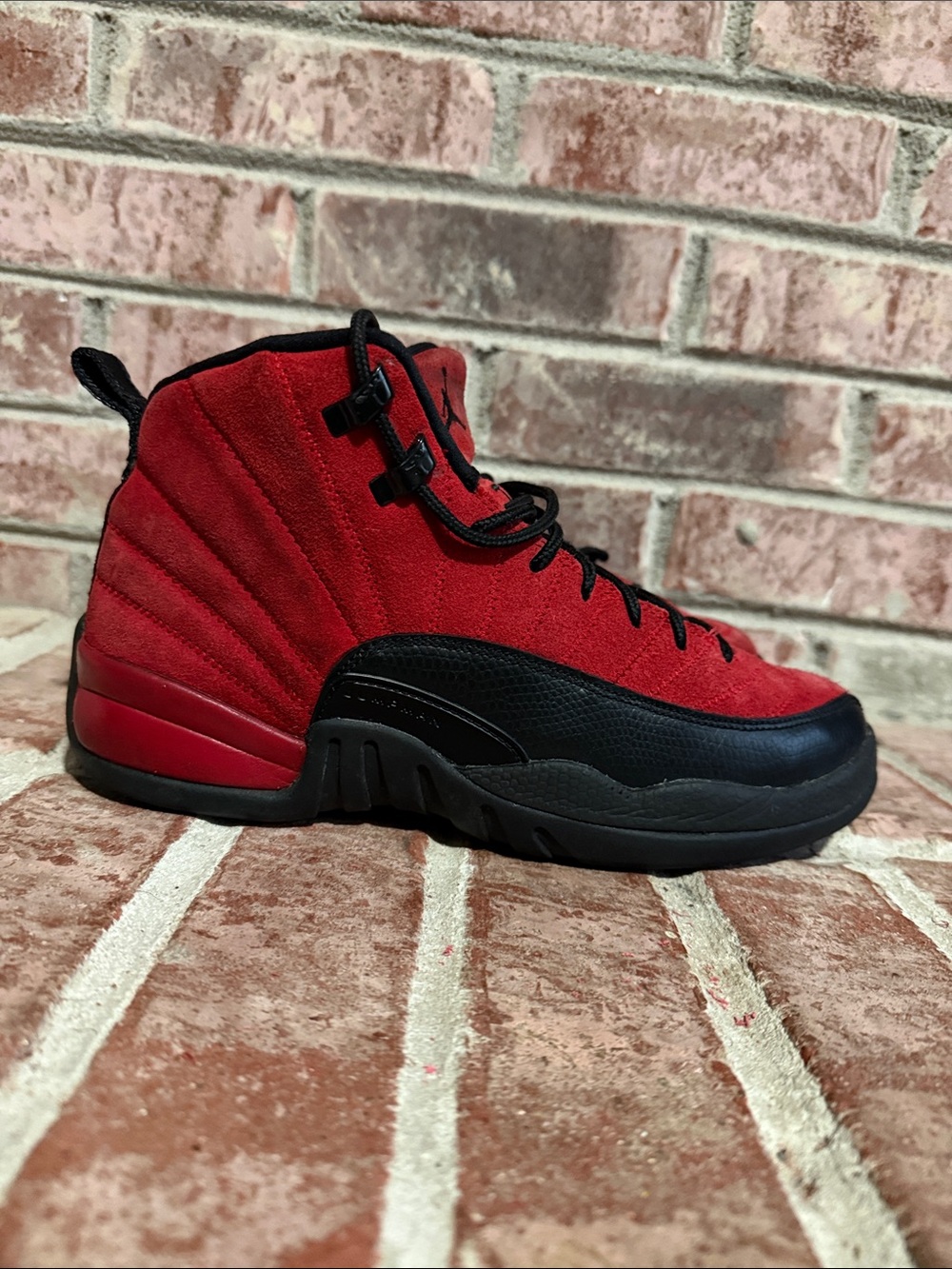 Kids Jordan 12 retro “reverse flu game “ Red and Black sneakers size 6.5y